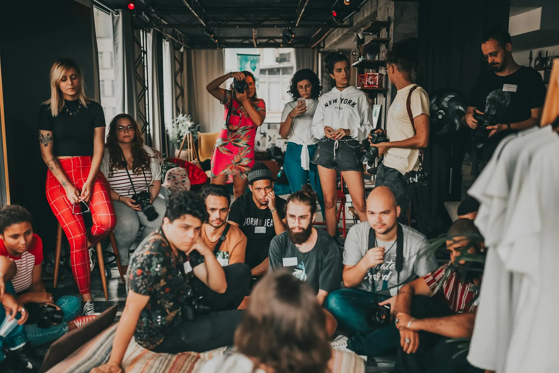 A group of people sitting and talking together at a community gathering