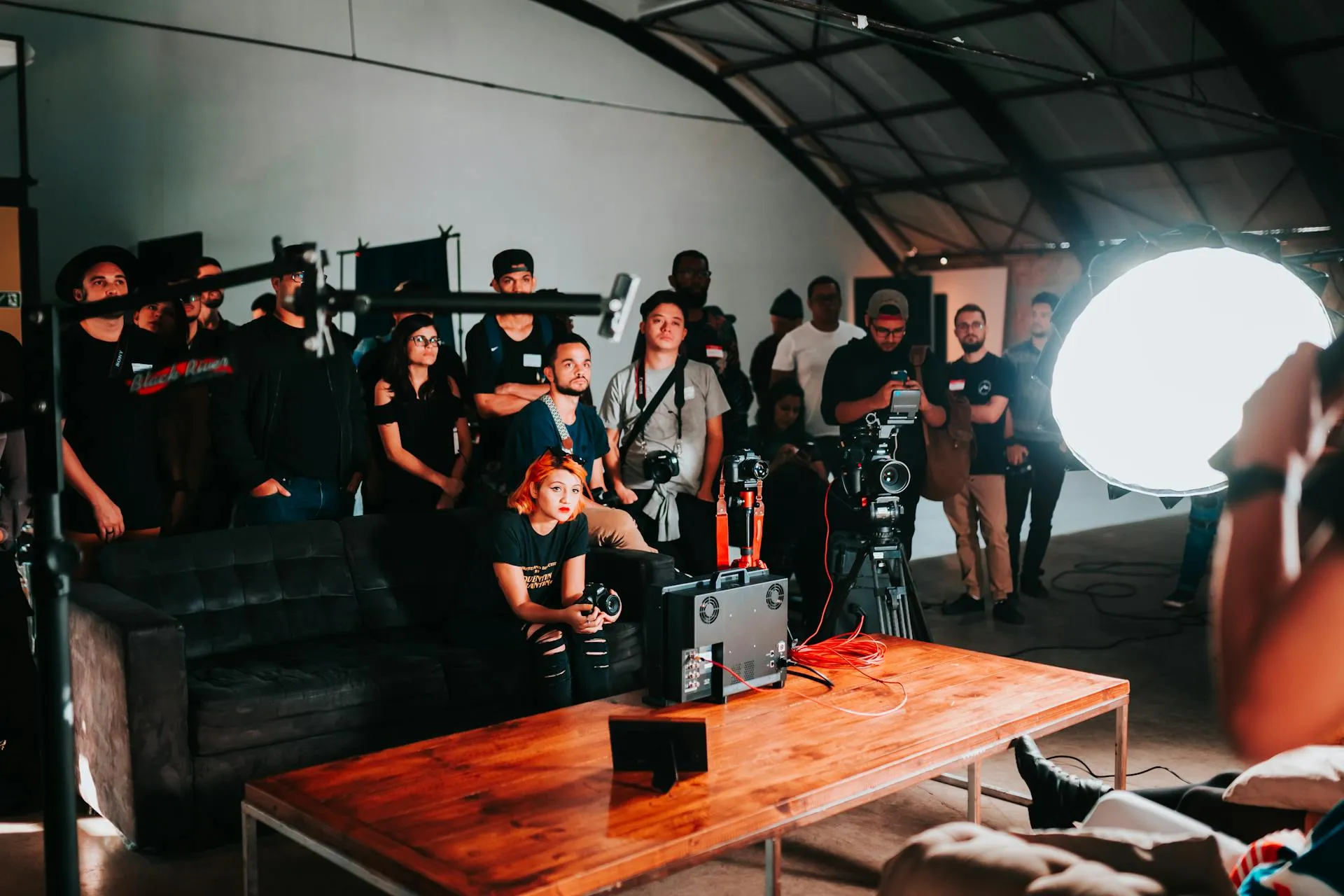 An audience engaged at a community media event